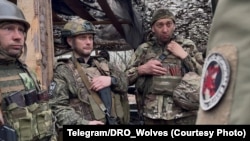 Combatanți ai brigăzii „Volki”, una dintre primele unități din Rusia care au început recrutarea prin sistemul „Redut”.