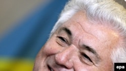 Many critics view the political maneuvering as a thinly veiled effort by acting Moldovan President Vladimir Voronin to keep the levers of power under his control.