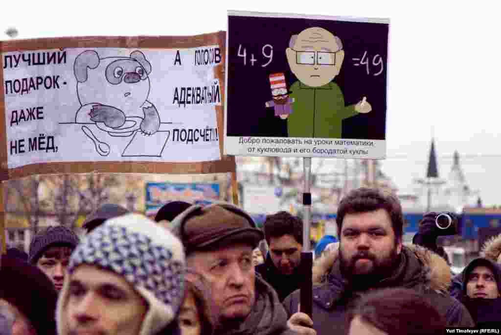 "4 + 9 = 49" is a reference to the 49 percent that Putin's United Russia party received in the elections, which protesters dispute.