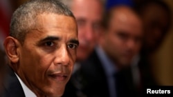 Президент США Барак Обама и члены его делегации во время встречи с президентом Европейского совета и президентом Европейской комиссии во время саммита НАТО в Варшаве. 8 июля 2016 года.