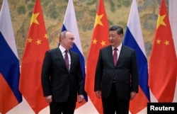 Vladimir Putin și Xi Jinping, înainte de ceremonia de deschidere a Jocurilor Olimpice