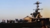 Image taken from video provided by the US Navy shows an aircraft launching from the USS Harry S. Truman in the Red Sea before air strikes in Sanaa, Yemen, on March 15.