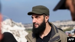 Udhëheqësi i i organizatës  Hayat Tahrir al-Sham (HTS), Ahmed al-Sharaa, që së fundmi mori pushtetin në Siri.