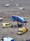 Emergency Teams Rescue Survivors Of Kazakhstan Plane Crash
