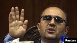 Afghanistan central bank governor Abdul Qadir Fitrat (in file photo) says he fears for his life.