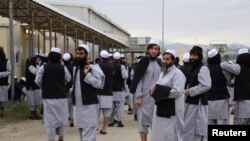 The prisoner exchange would see President Ashraf Ghani release 5,000 Taliban prisoners, including many hardened fighters likely to return to the battlefield.
