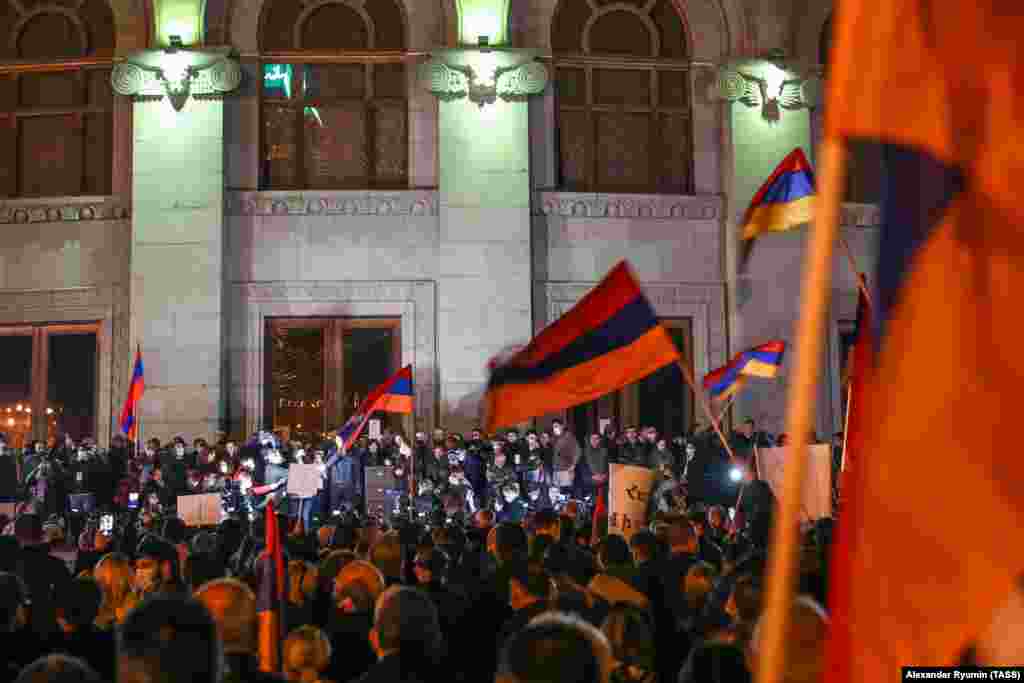 People take part in a protest on Yerevan's Freedom Square demanding Pashinian's resignation.