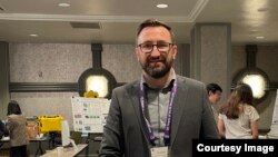 Ion Turcanu, la una din conferințele unde își prezintă lucrările 