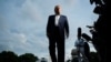 US President Donald Trump speaks to reporters as he arrives on the South Lawn of the White House on May 4.