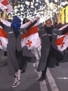 Anti-Government Protesters Dance Through Tbilisi