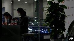 Tesla компаниясынын Бээжиндеги шоуруму. 4-январь, 2022-жыл. Иллюстрациялык сүрөт