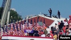 Snajperisti na krovu kod mesta skupa na kojem je je pucano na Donalda Trampa, Batler, 13. jul 2024.