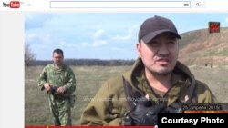 Нурлан. Скриншот видео. 