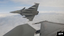 A French Air Force Dassault Rafale B fighter jet configured for air-to-air weaponry is deployed at an unspecified location in the Polish airspace during an exercise as part of NATO's Eastern Sentry operation on September 13.