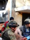 Ukrainian Woman Rescued After Russian Bombing