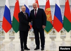 ვლადიმირ პუტინი და ალიაქსანდრ ლუკაშაენკა, მინსკი, 2022 წ. 19 დეკემბერი