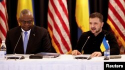 U.S. Defense Secretary Lloyd Austin (left) and Ukrainian President Volodymyr Zelenskiy attend a meeting of the Ukraine Defense Contact Group at the Ramstein Air Base in Germany on September 6.