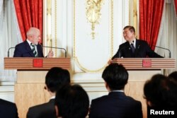 Președintele brazilian, Luiz Inacio Lula da Silva (stânga), și prim-ministrul japonez, Shigeru Ishiba, participă la o conferință de presă comună la Akasaka Palace State Guest House în Tokyo, Japonia, 26 martie 2025.