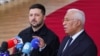 Ukrainian President Volodymyr Zelenskiy (left) and European Council President Antonio Costa attend the European Union leaders' summit in Brussels on October 23. 