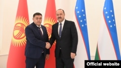 УКМК төрагасы Камчыбек Ташиев (солдо) жана Өзбекстандын премьер-министри Абдулла Арипов. Ташкент. 24-март, 2021-жыл.