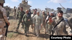 یکی از ده‌ها عکسی که قاسم سلیمانی را در عملیاتی خارج از ایران نشان می‌دهد