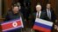 Președintele rus, Vladimir Putin, întâmpinat de liderul nord-coreean, Kim Jong Un, la Aeroportul din Phenian, Coreea de Nord, pe 19 iunie 2024. În timpul vizitei, Putin și Kim au semnat un tratat de parteneriat strategic între Rusia și Coreea de Nord.