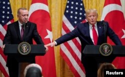 Erdogan we ABŞ-nyň prezidenti Donald Trump. 2019-njy ýylyň noýabr aýy, Waşington.
