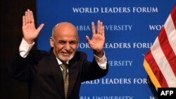 Afghanistan's President Ashraf Ghani gestures as he arrives to speak at Columbia University in New York on March 26.