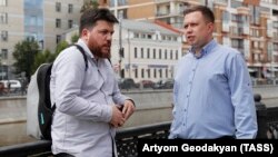 Aleksei Navalny's national campaign chief, Leonid Volkov (left), was detained in Nizhny Novgorod, while Moscow office chief Nikolai Lyaskin (right), was recently attacked on the street. (file photo)