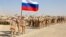 Российские войска перед началом совместных военных учений с Таджикистаном и Узбекистаном к северу от таджикской границы с Афганистаном 10 августа.
