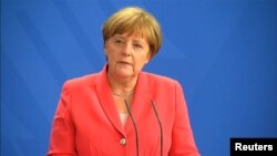 МеркелMerkel Praises Turkish Ties After Armenian Genocide Vote