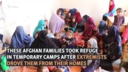 'They Would Cut Us Into Pieces': Afghan Civilians Flee Taliban Attacks In Kunduz