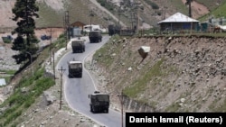 An Indian army convoy moves towards Leh, the capital of the Ladakh region on June 15.